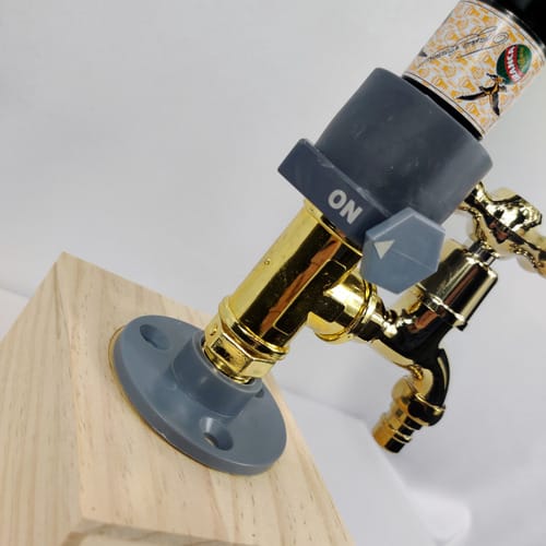 Dispensador de botella con canilla