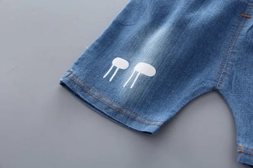 Conjunto niño short y camisa jirafa en bolsillo