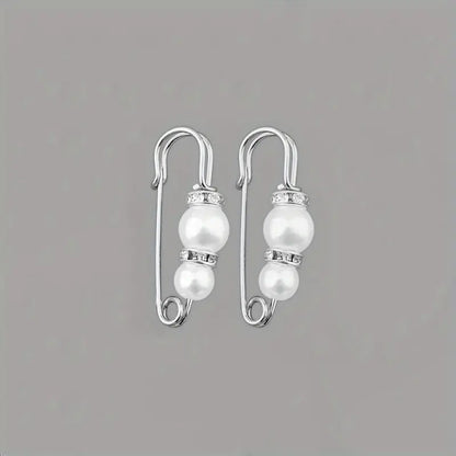 Broches ajustadores de ropa