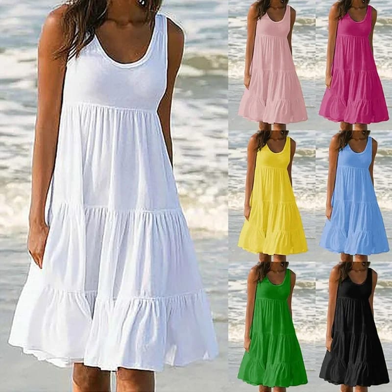 Vestido corto de mujer casual, cuello redondo, sin mangas, con volados. Modelo holgado oversize.