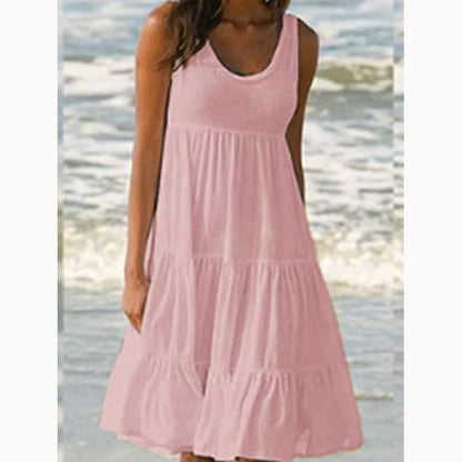 Vestido corto de mujer casual, cuello redondo, sin mangas, con volados. Modelo holgado oversize.