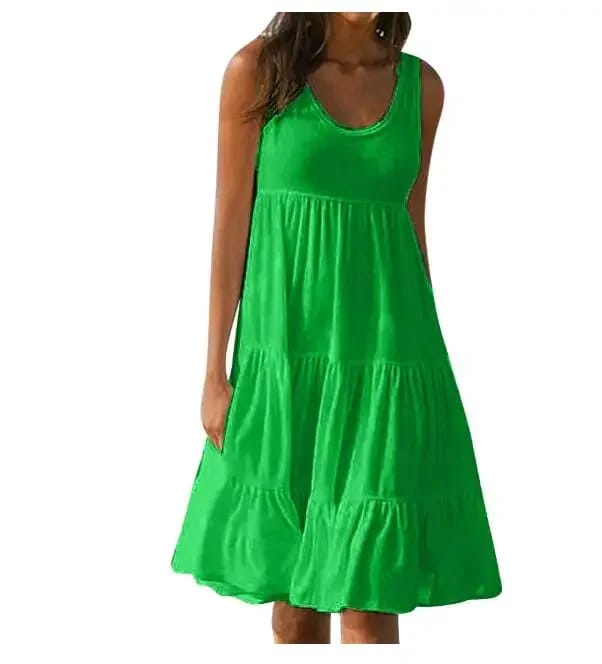 Vestido corto de mujer casual, cuello redondo, sin mangas, con volados. Modelo holgado oversize.