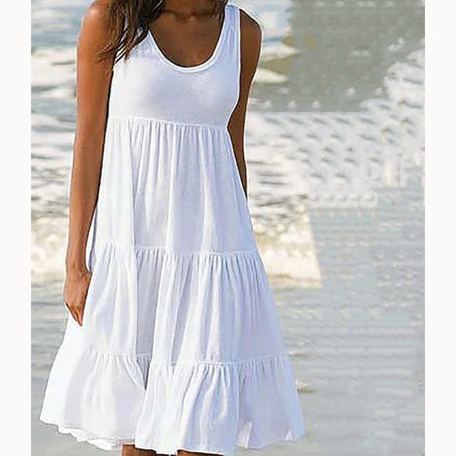 Vestido corto de mujer casual, cuello redondo, sin mangas, con volados. Modelo holgado oversize.