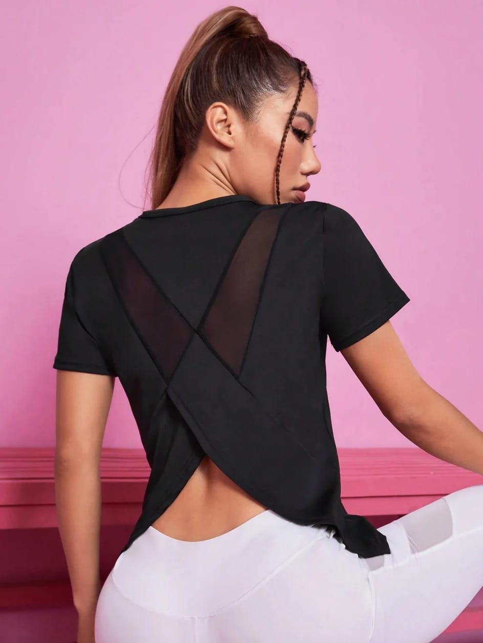 Remera deportiva de manga corta para mujer, ideal para yoga y fitness. Holgada, transpirable, de secado rápido y con espalda de red, perfecta para el verano.