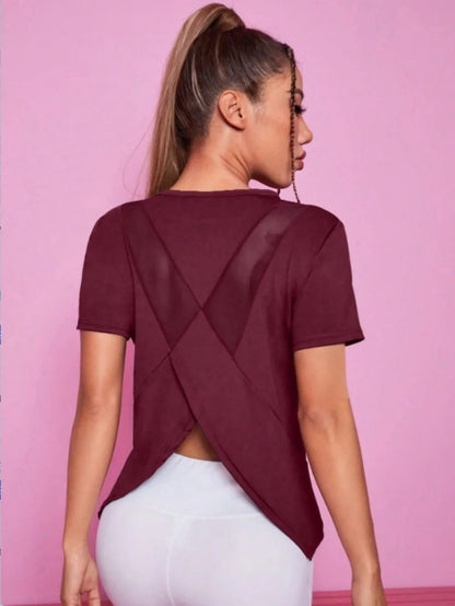 Remera deportiva de manga corta para mujer, ideal para yoga y fitness. Holgada, transpirable, de secado rápido y con espalda de red, perfecta para el verano.