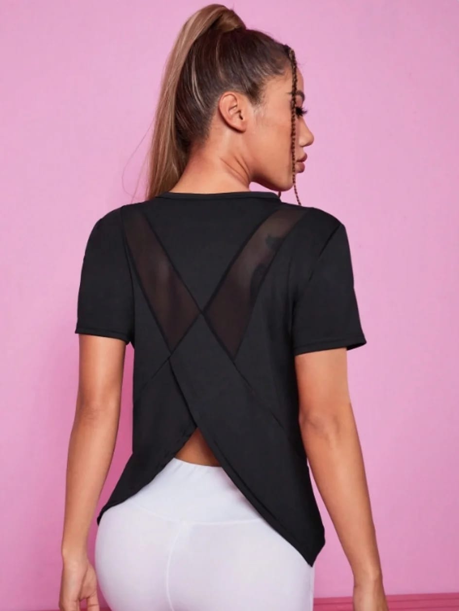 Remera deportiva de manga corta para mujer, ideal para yoga y fitness. Holgada, transpirable, de secado rápido y con espalda de red, perfecta para el verano.