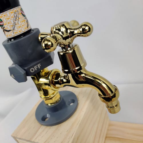 Dispensador de botella con canilla