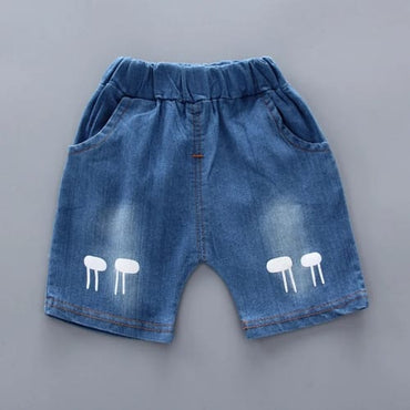 Conjunto niño short y camisa jirafa en bolsillo