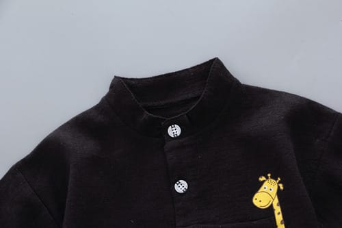 Conjunto niño short y camisa jirafa en bolsillo