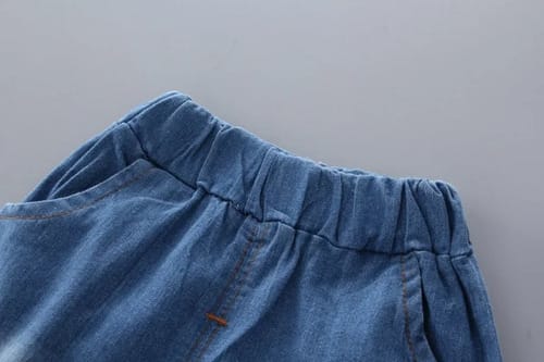 Conjunto niño short y camisa jirafa en bolsillo