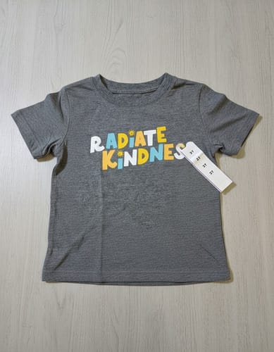Remera MC Radiate kindness niño