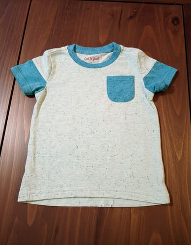 Remera MC con bolsillos niño 