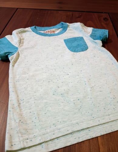 Remera MC con bolsillos niño 