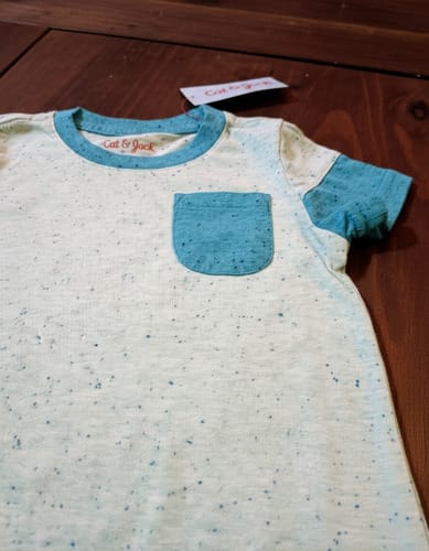 Remera MC con bolsillos niño 