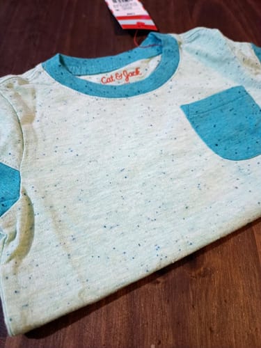 Remera MC con bolsillos niño 