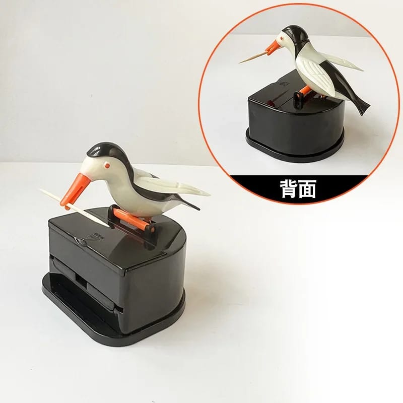 Dispenser automático de palillos con diseño de pajarito. 