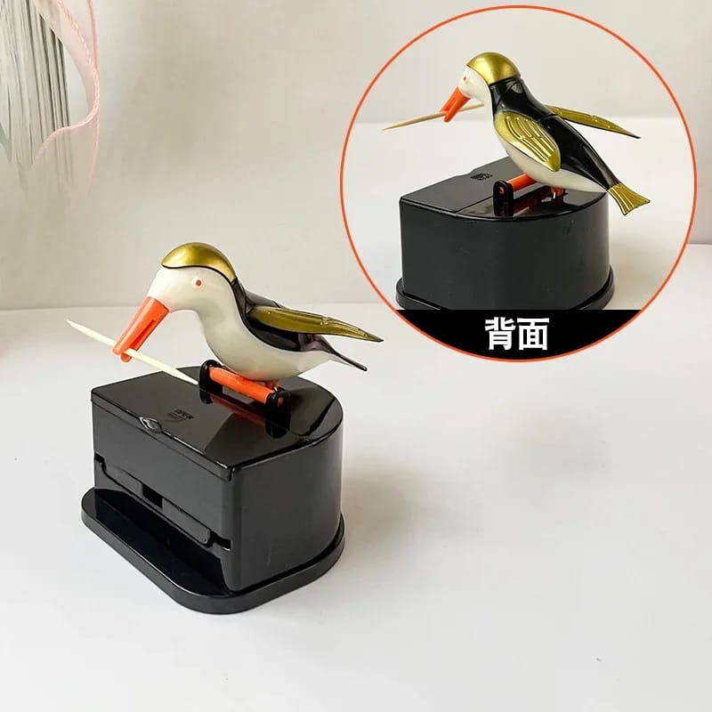 Dispenser automático de palillos con diseño de pajarito. 