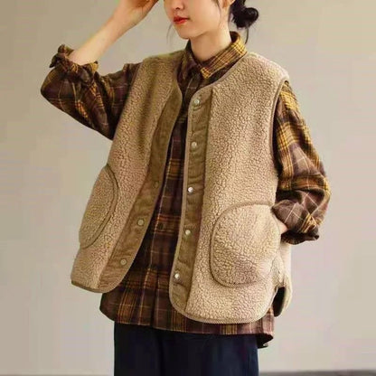 Chaleco de mujer reversible doble capa, con forro de pana, de calce holgado. Ideal para media estación.