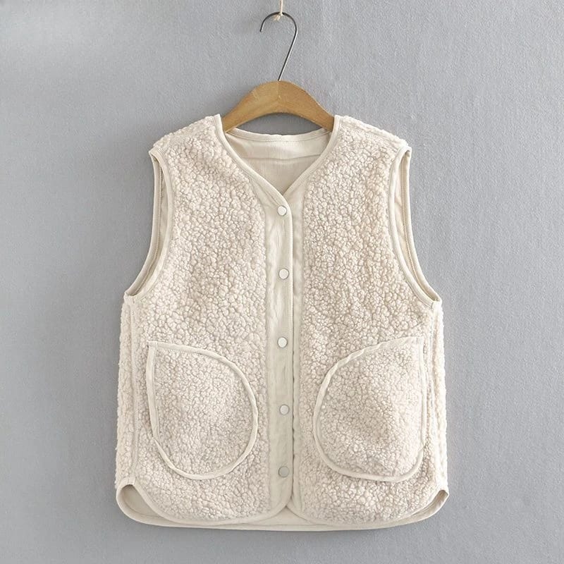 Chaleco de mujer reversible doble capa, con forro de pana, de calce holgado. Ideal para media estación.