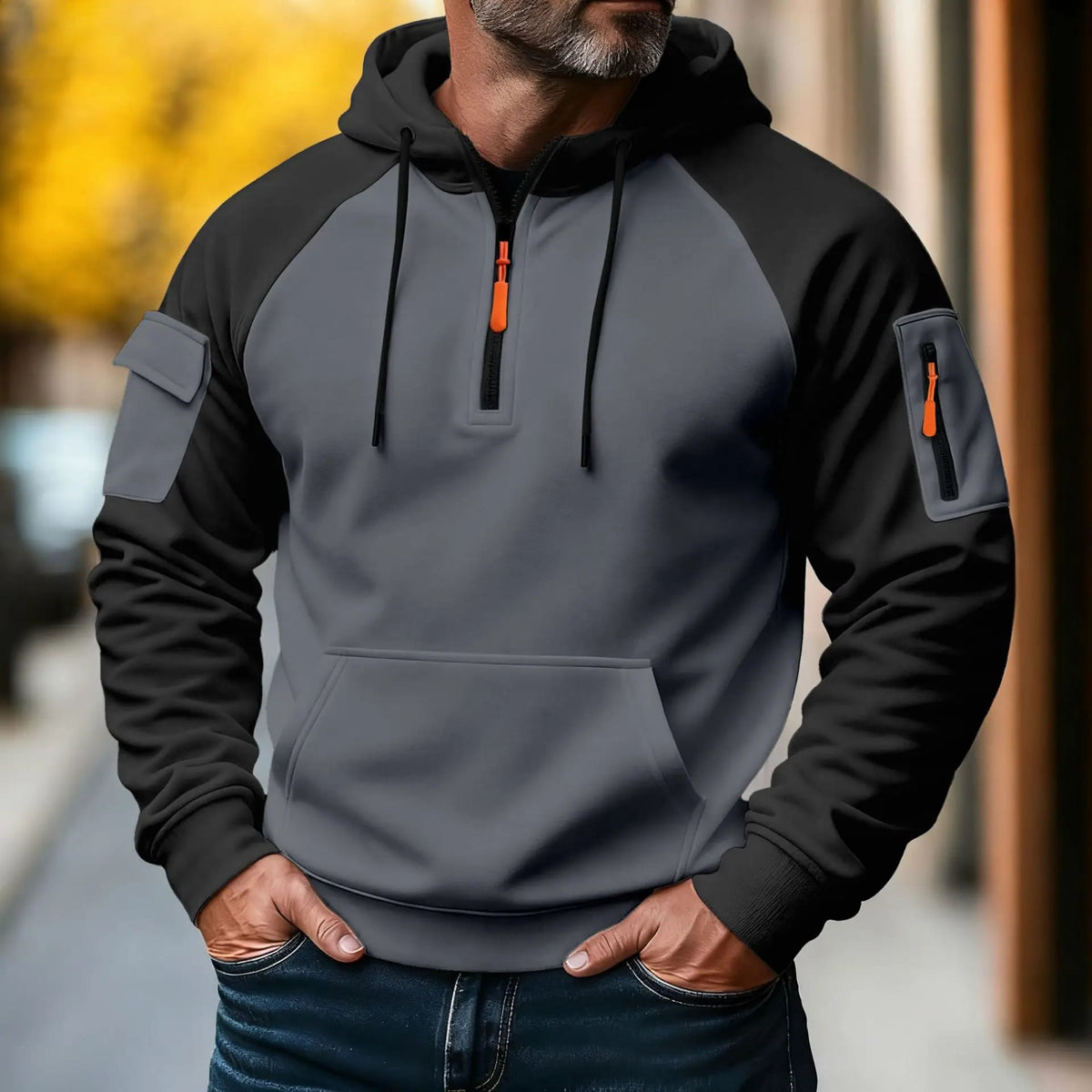 Buzo de hombre moderno para media estación, casual deportivo, con cierre, capucha, manga larga y varios bolsillos.