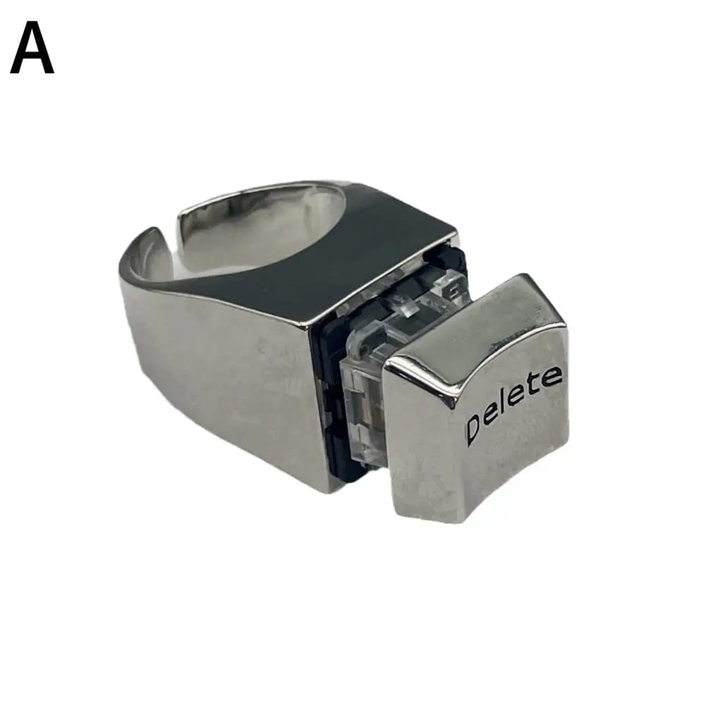 Anillo con diseño de tecla 'Delete' de teclado, ideal para amantes de la informática y la cultura geek. Un accesorio original de metal.