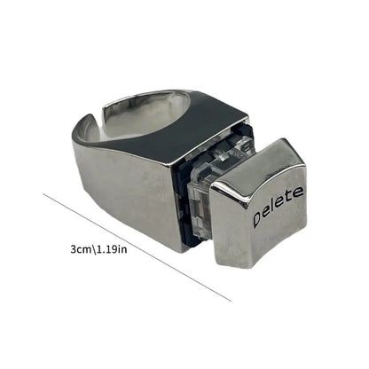 Anillo con diseño de tecla 'Delete' de teclado, ideal para amantes de la informática y la cultura geek. Un accesorio original de metal.