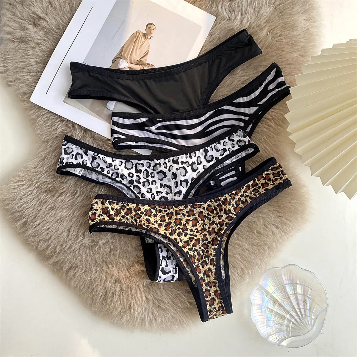 Tanga de mujer sexy con estampado de leopardo, tiro bajo, de seda helada y algodón, sin costuras. Lencería femenina.