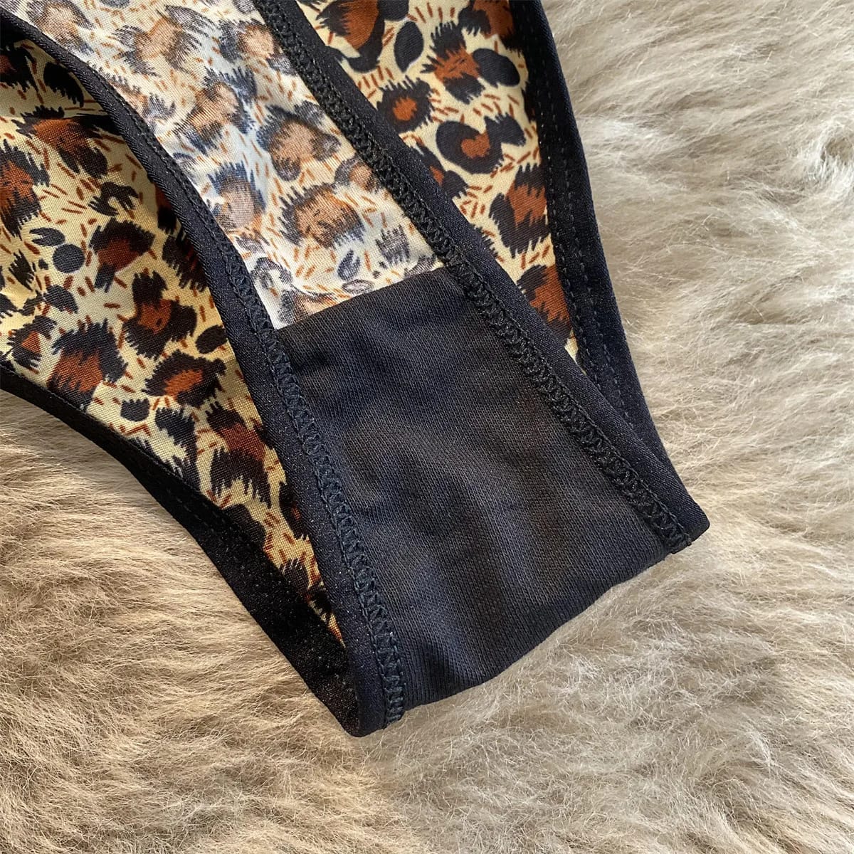 Tanga de mujer sexy con estampado de leopardo, tiro bajo, de seda helada y algodón, sin costuras. Lencería femenina.