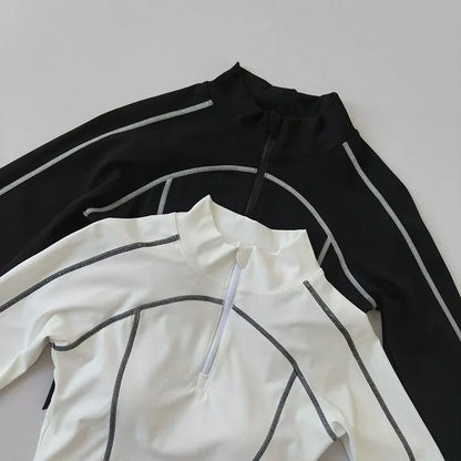 Top Deportivo de Mujer Manga Larga Cuello Alto con Medio Cierre, Ajustado, de Secado Rápido, con Copas Integradas para Fitness, Entrenamiento y Yoga.
