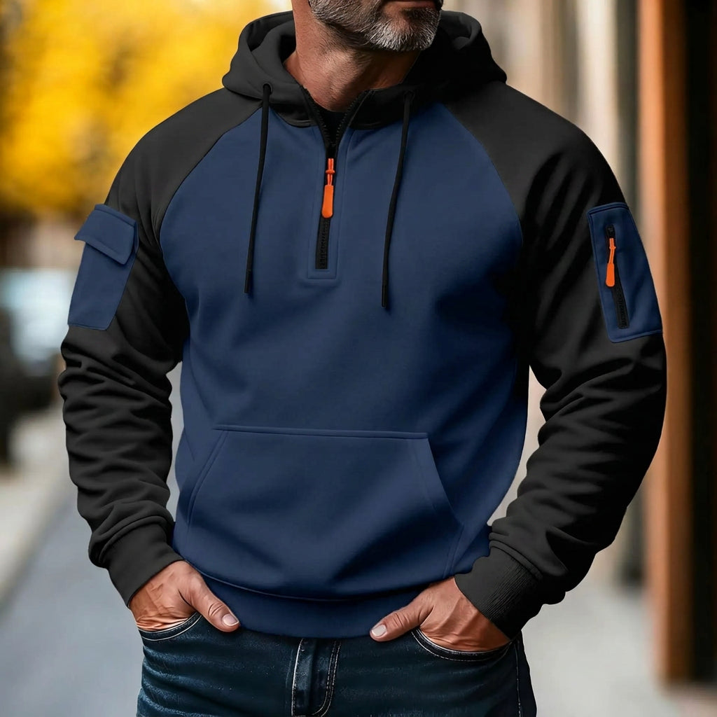 Buzo de hombre moderno para media estación, casual deportivo, con cierre, capucha, manga larga y varios bolsillos.