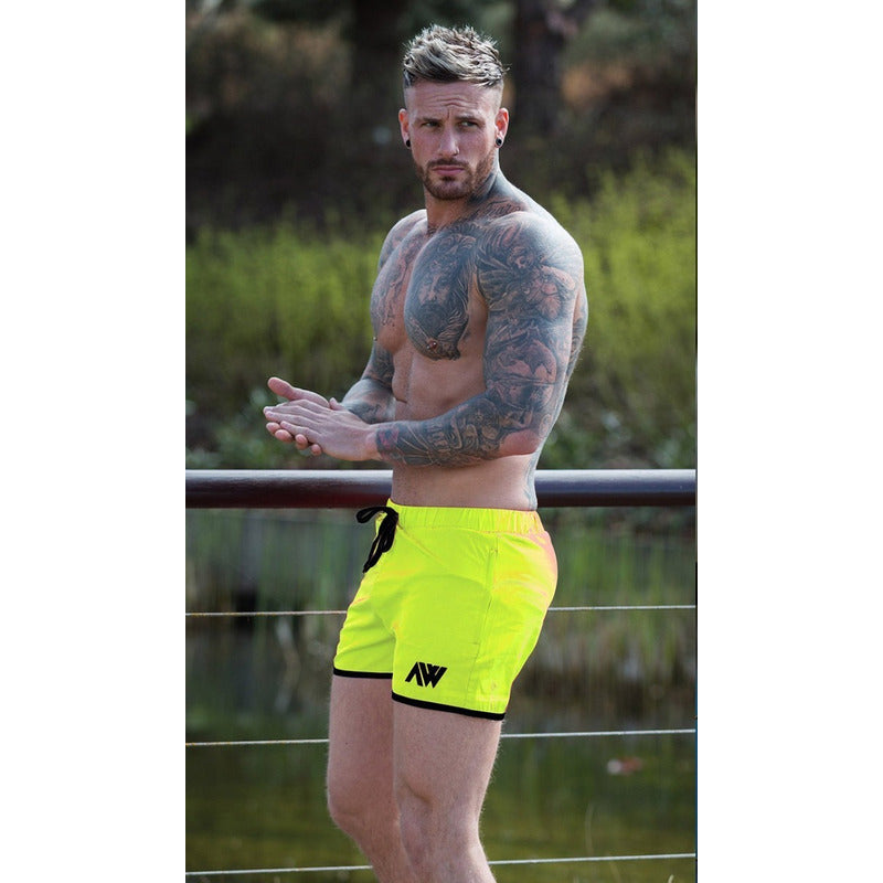Short hombre verde fluo