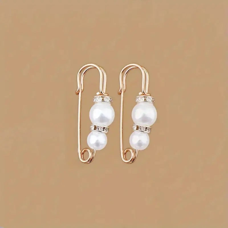 Broches ajustadores de ropa