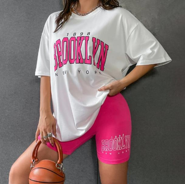 Conjunto dama Brookling remera y biker - Fucsia