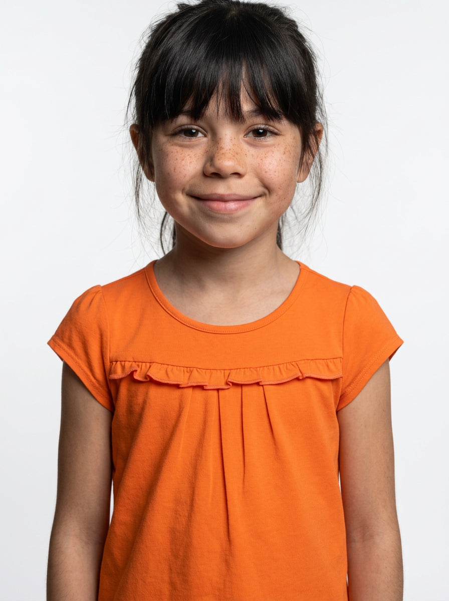 Remera niña lisa manga con volado