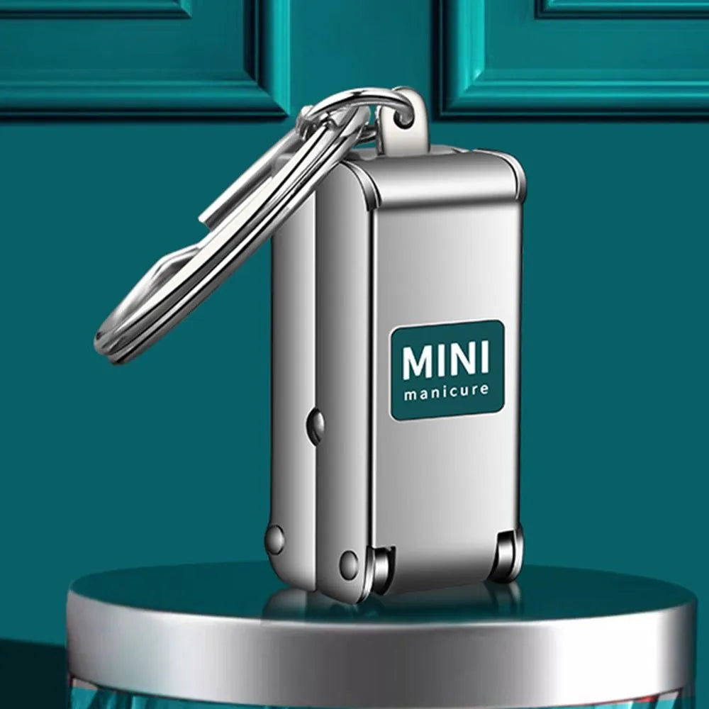 llavero Cortauñas metalico 