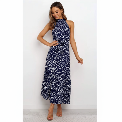 Maxivestido con volado y cuello halter lunares