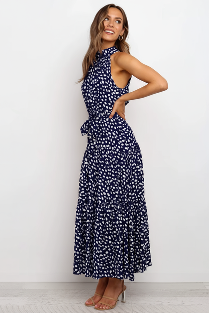 Maxivestido con volado y cuello halter lunares