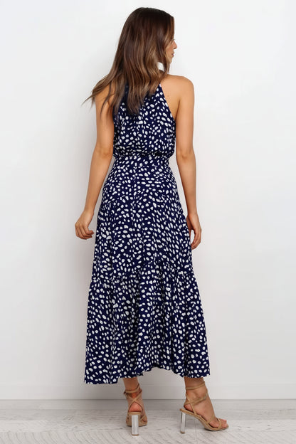 Maxivestido con volado y cuello halter lunares