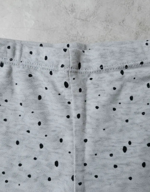 Pantalon niña tipo calza pintitas negras