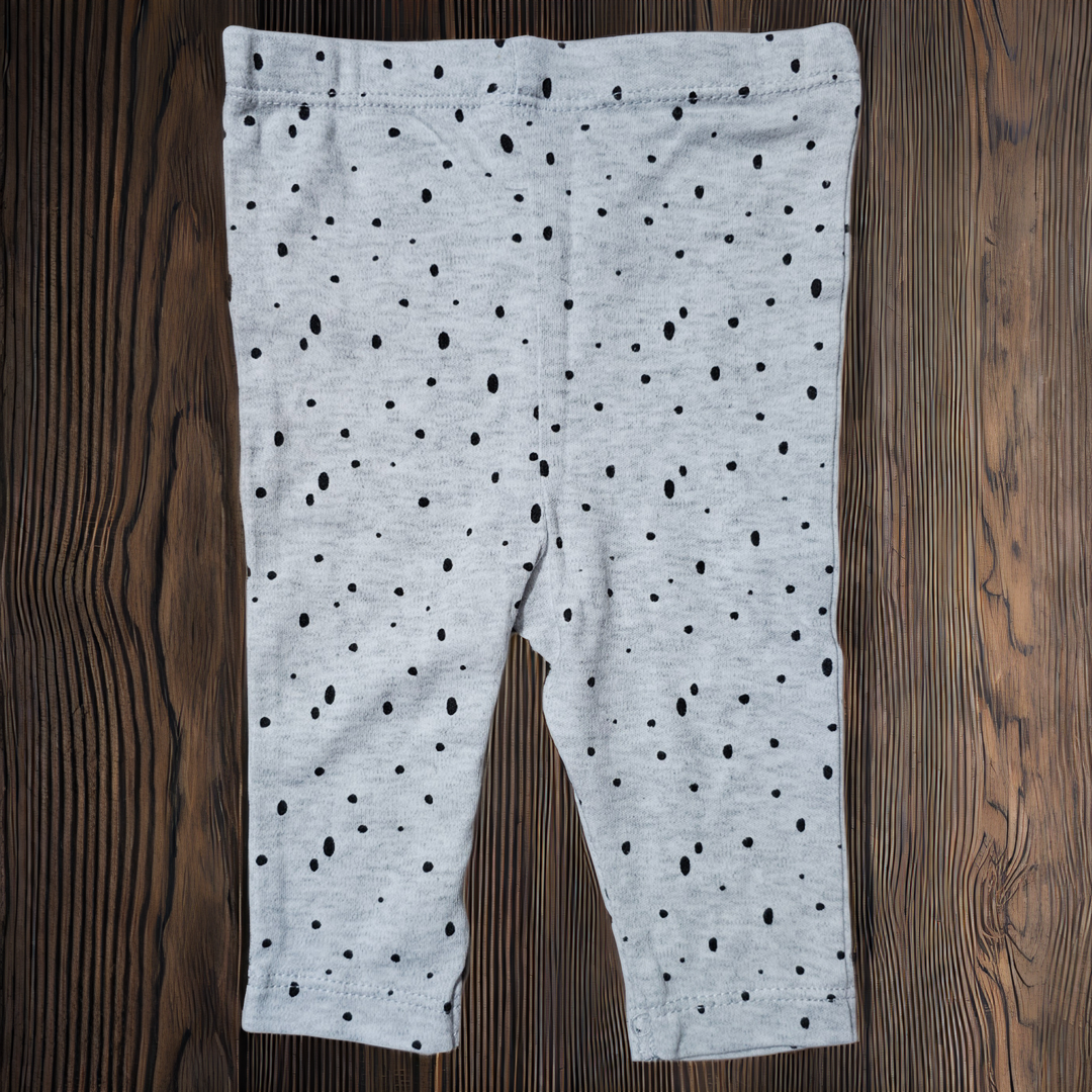 Pantalon niña tipo calza pintitas negras