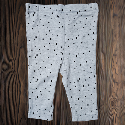 Pantalon niña tipo calza pintitas negras
