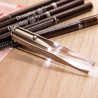 Pinza de cejas con luz 