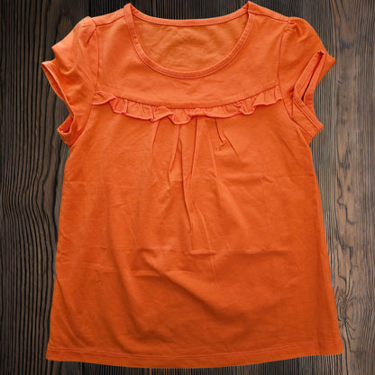 Remera niña lisa manga con volado