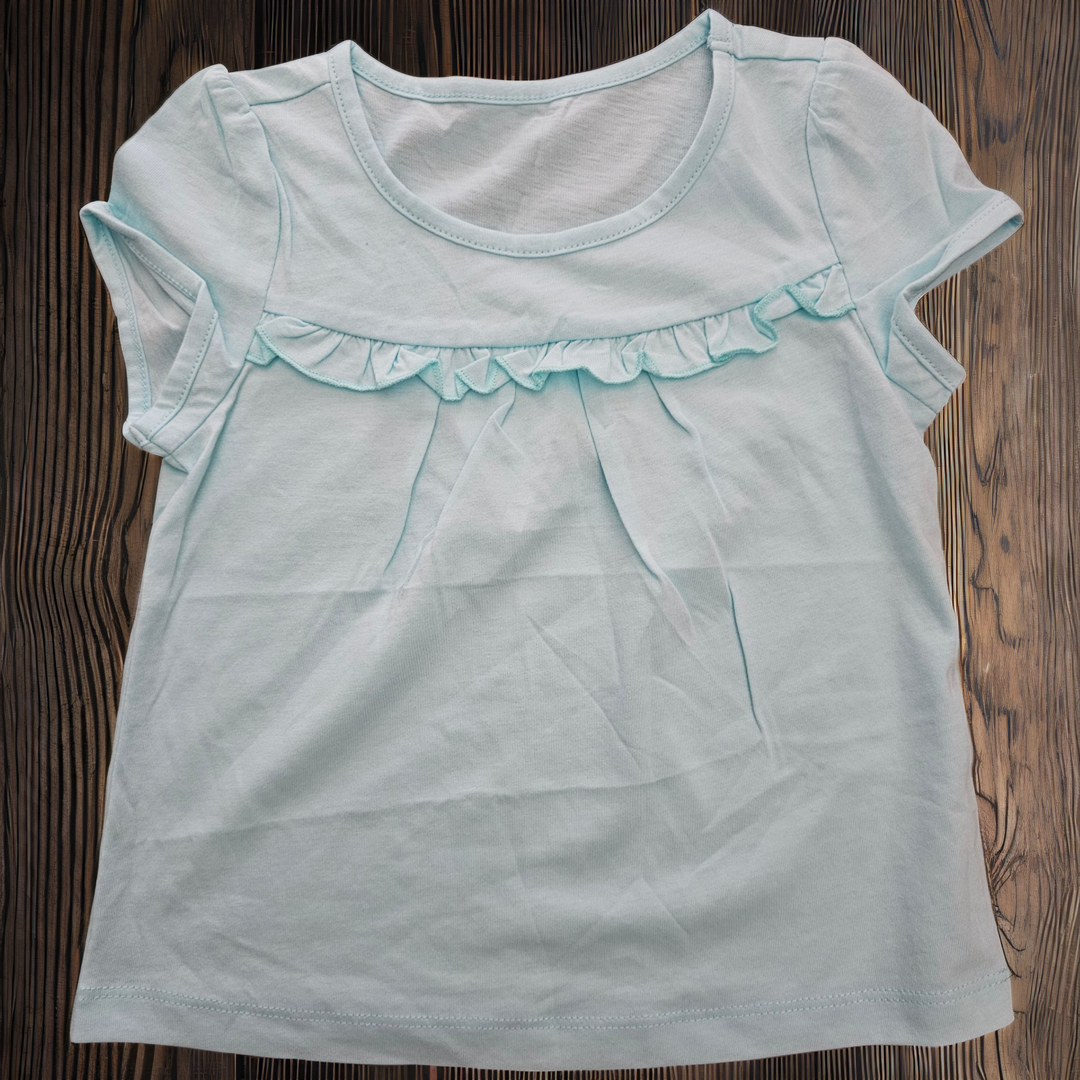 Remera niña lisa manga con volado